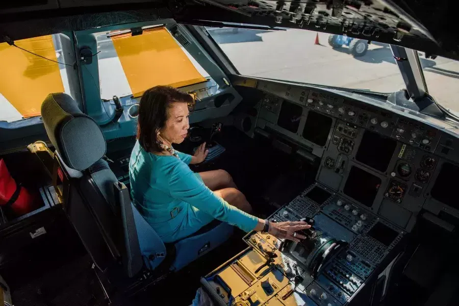 Melinda Yee Franklin sitting in the cockpit.